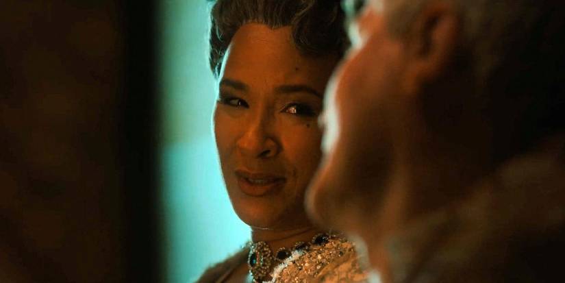 Queen Charlotte under the bed with Geore in Quee Charlotte a Bridgerton Story