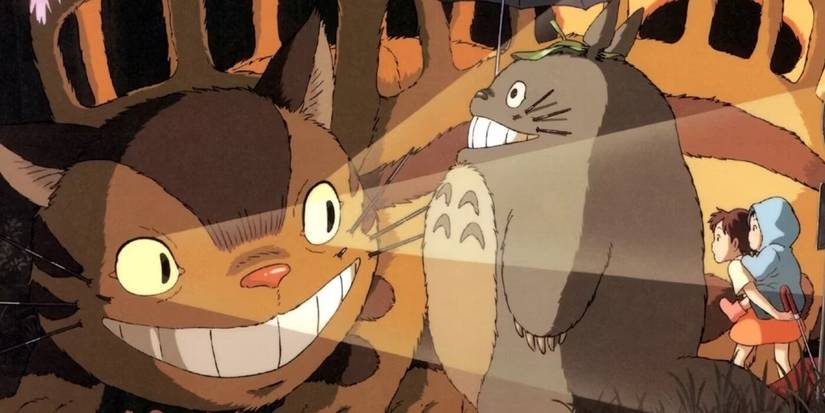The Catbus shines his eyelights on Totoro, Satsuki and Mei in My Neighbor Totoro.
