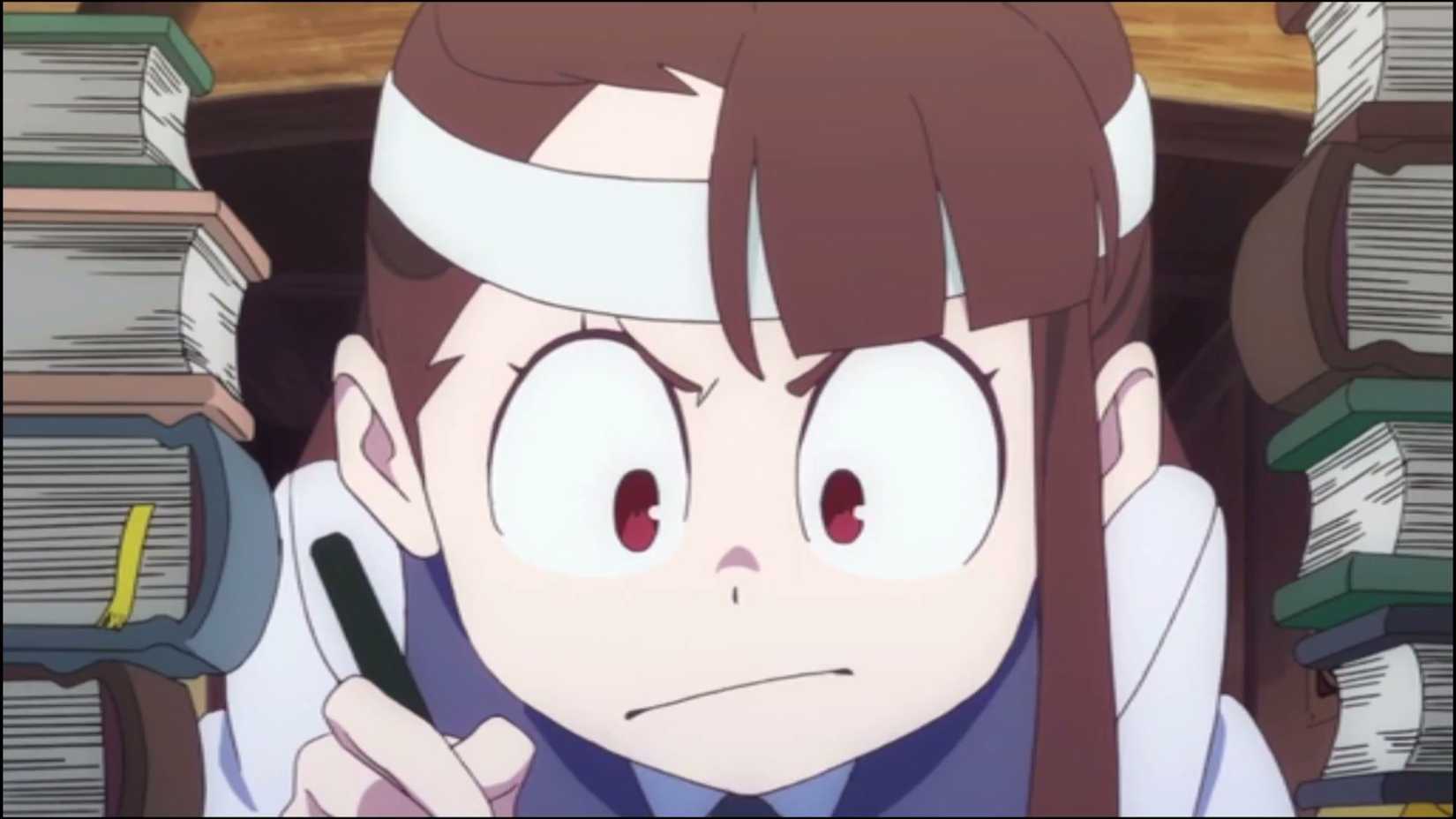 Atsuko Kagari from Little Witch Academia writing with an upset look