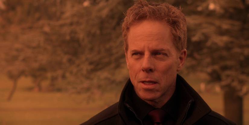 Greg Germann as Hades in a dark lit scene from Once Upon a Time