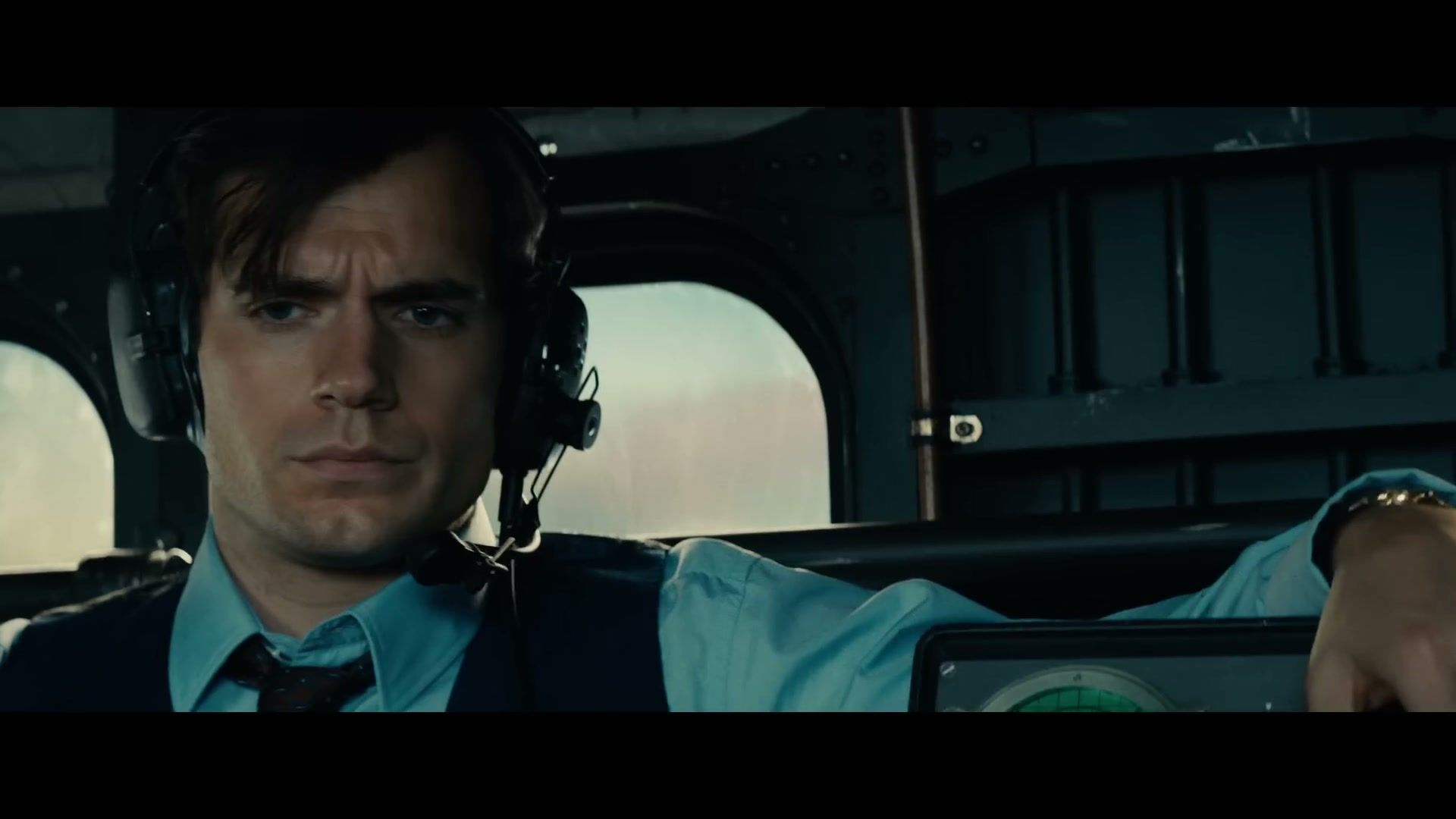 Henry Cavill as Napoleon Solo on The Man from U.N.C.L.E. flying on a helicopter