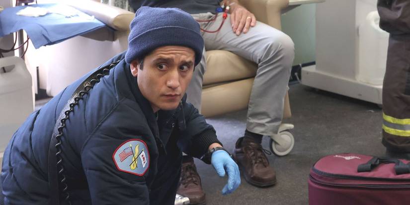 Jared Lennox (actor Wesam Keesh) kneels in paramedic gear in Chicago Fire Season 12