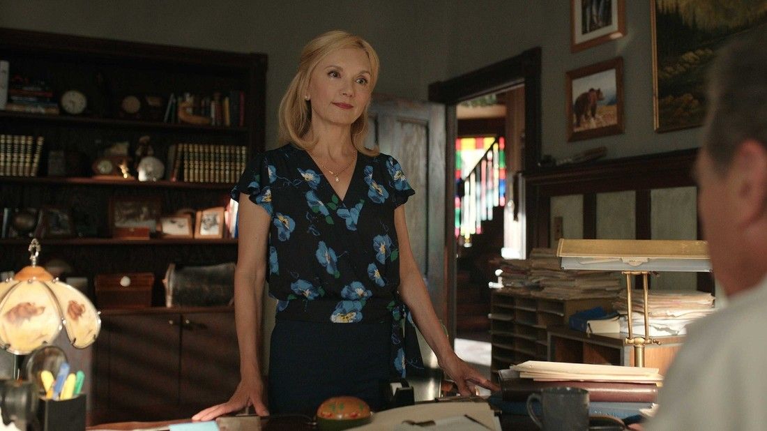 Muriel stands at Doc's desk in Virgin River