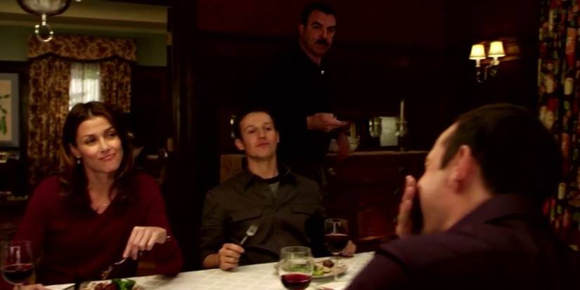 The Reagan family sits together for dinner in Blue Bloods.