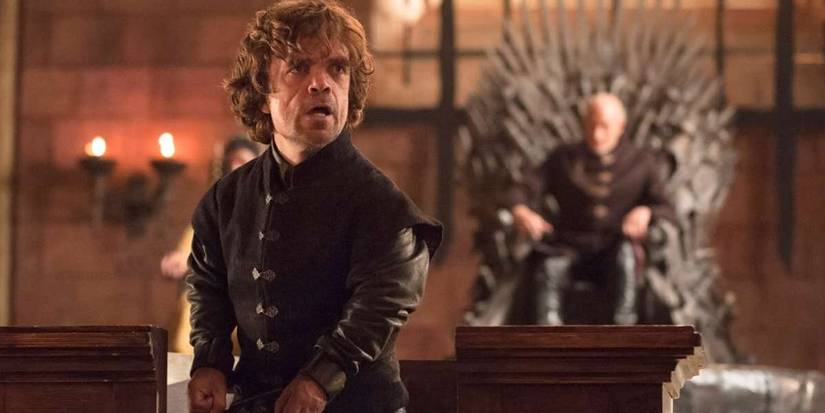 Tyrion arguing at his trial while his father watches in the background from Game of Thrones.