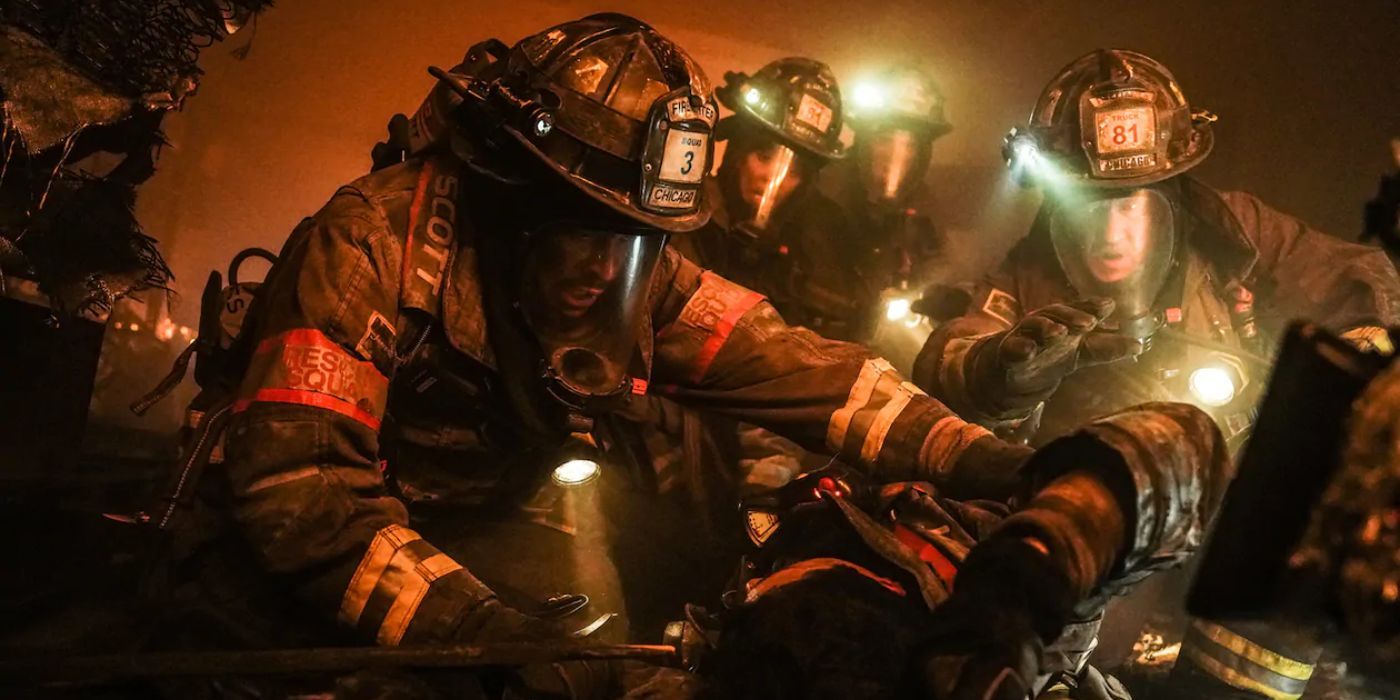 Joe Minoso as Firefighter Joe Cruz with his fellow firefighters recovering the body of Brian 'Otis' Zvonecek in Chicago Fire episode "Sacred Ground"
