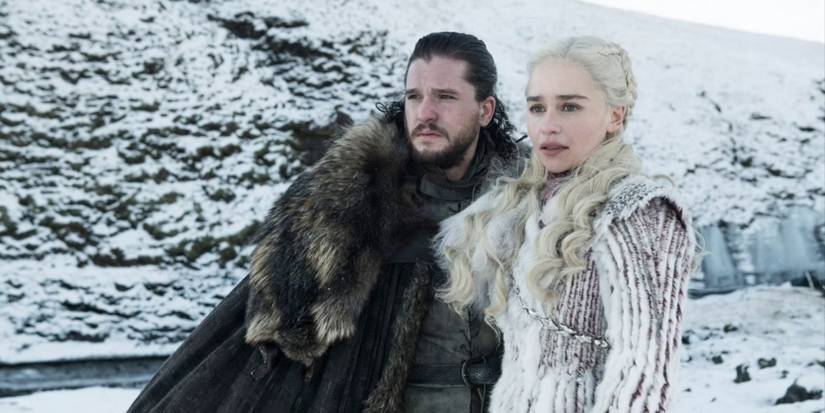 Jon Snow (Kit Harington) and Daenerys Targaryen (Emilia Clark) in a snowy landscape on Game of Thrones