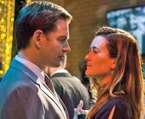 Michael Weatherly as Tony DiNozzo and Cote de Pablo as Ziva David dance together on NCIS