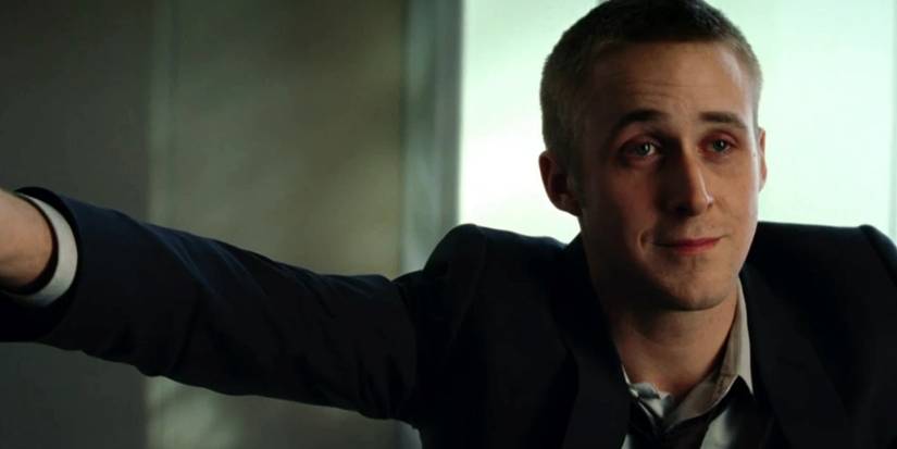 Ryan Gosling leans on a post in Fracture