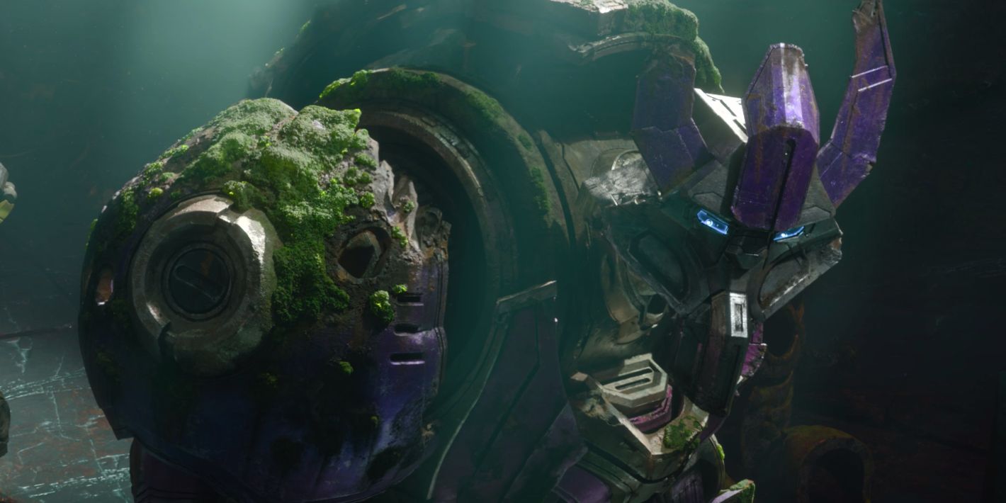 Alpha Trion within his cave covered in moss
