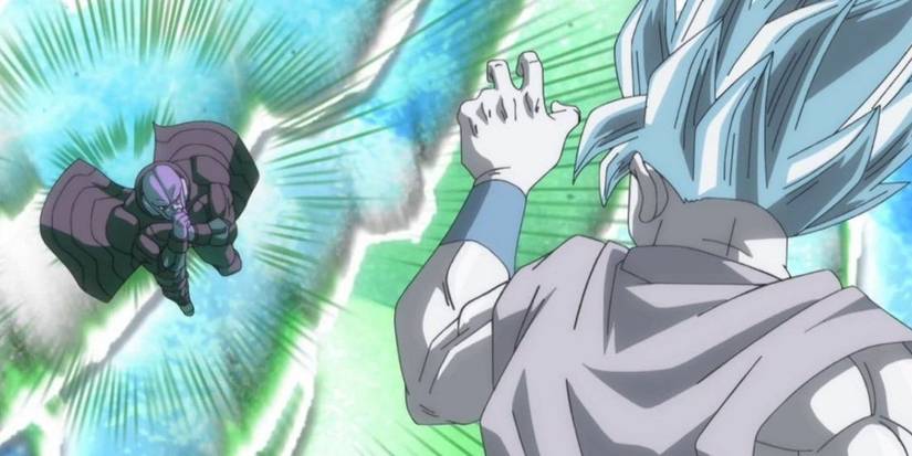 Goku braces for impact from Hit's Time-Skip Technique in Dragon Ball Super.