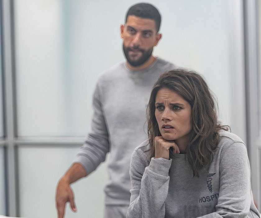 FBI Agents Maggie Bell (Missy Peregrym) and OA Zidan (Zeeko Zaki) in the hospital in FBI episode "Doomsday"