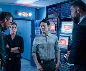 FBI Special Agents OA Zidan (Zeeko Zaki) and Maggie Bell (Missy Peregrym) with ASAC Jubal Valentine (Jeremy Sisto) and Analyst Ethan Lim (James Chen) in a computer room in FBI episode "Hacktivist"