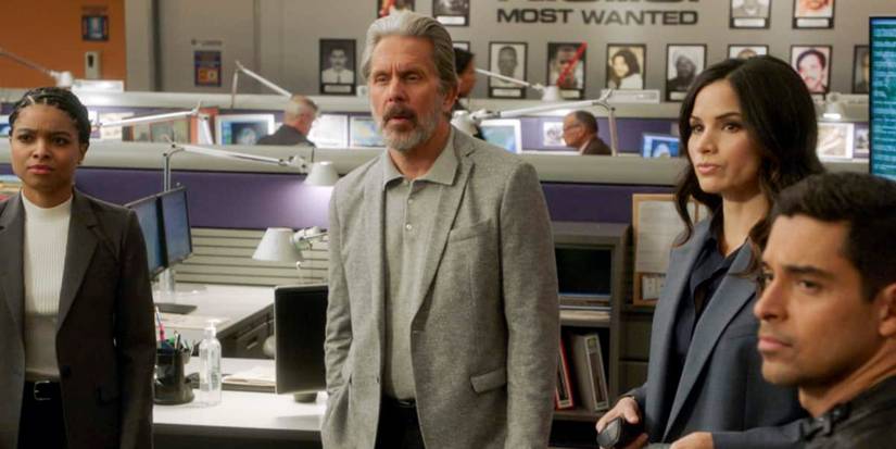 Gary Cole as Alden Parker, Katrina Law as Jessica Knight, and Wilmer Valderrama as Nicholas Torres look at evidence with a client on NCIS