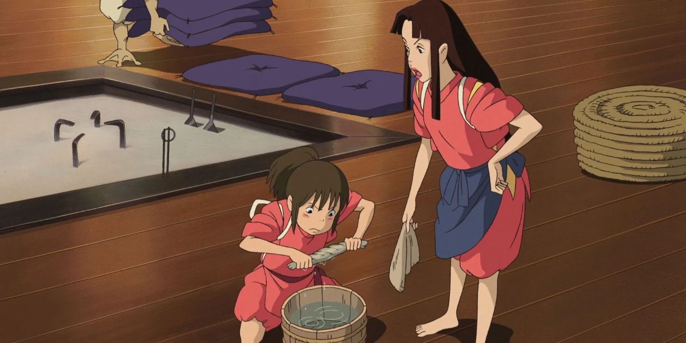 Lin teaches Chihiro how to properly wash the floors of the bathhouse.