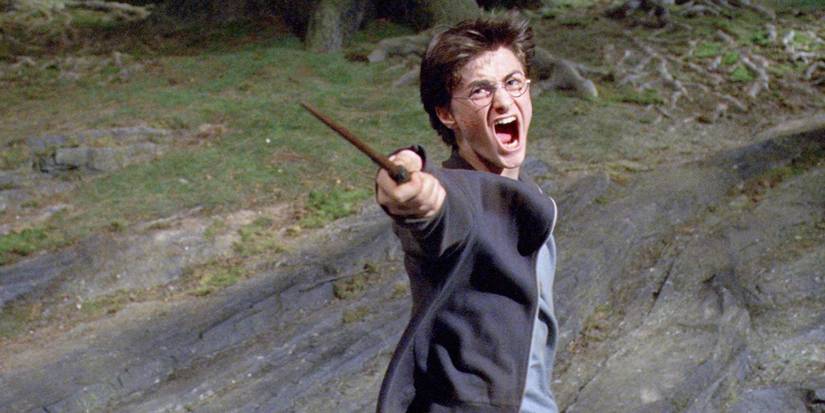 Harry Potter (Daniel Radcliffe) fending off dementors with his wand.