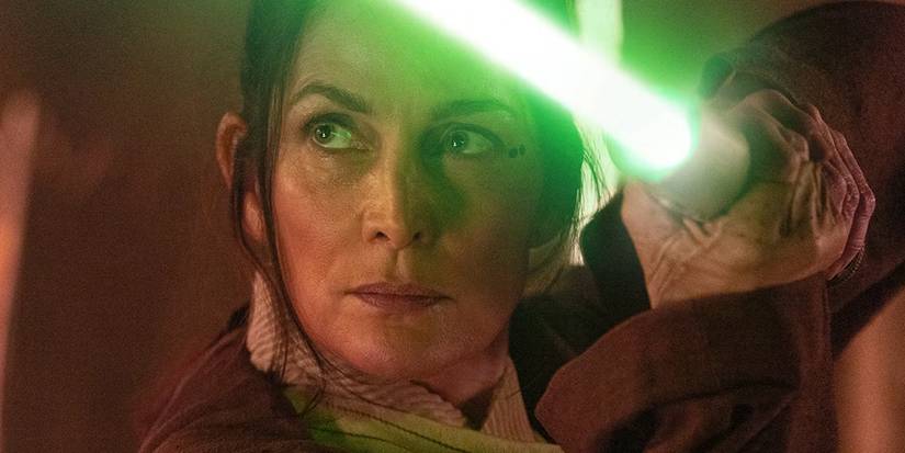 Master Indara (Carrie Anne-Moss) wields her lightsaber in The Acolyte