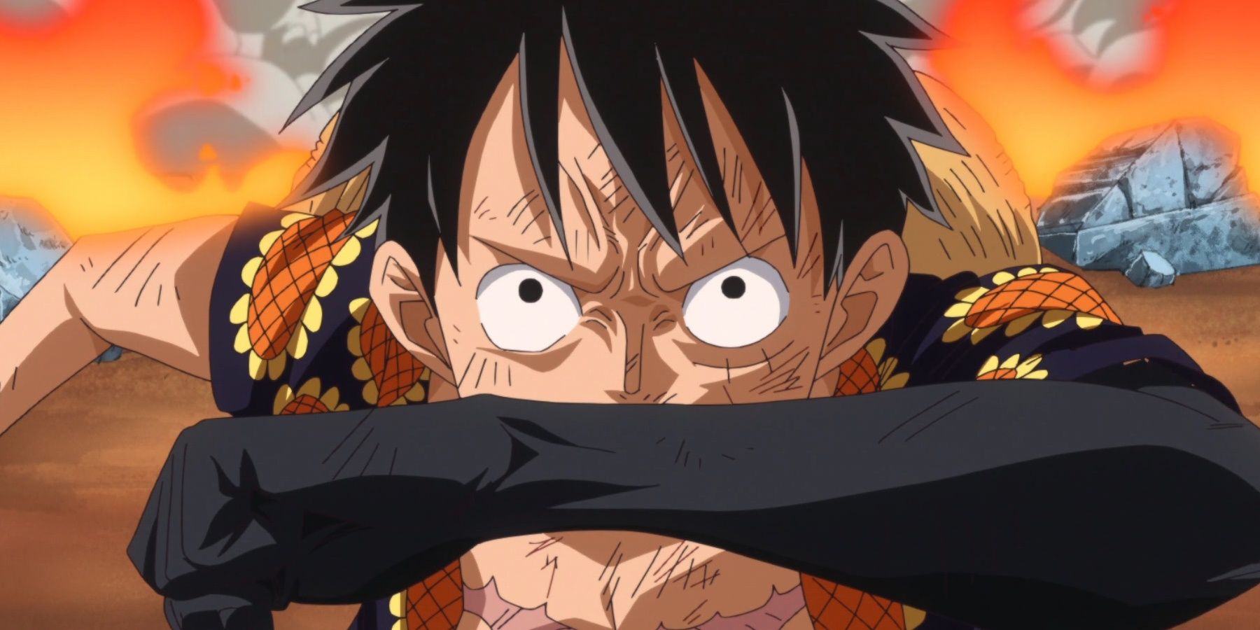 Luffy ergue seu braço enquanto usa o haki da cor das armas