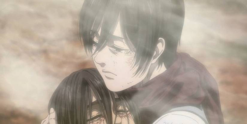 Mikasa tient le corps d'Eren