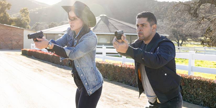 NCIS Agents Jessica Knight (Katrina Law) and Nick Torres (Wilmer Valderrama) with guns drawn in NCIS episode "Prime Cut"