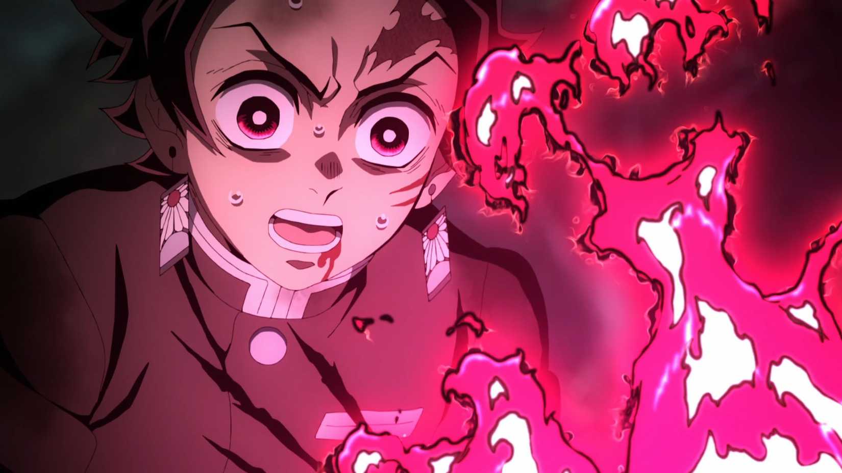 Tanjiro stares in shock at pink fire in Demon Slayer