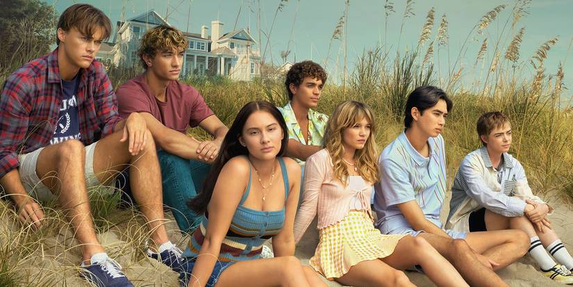 The summer I became pretty casting is sitting at the beach.
