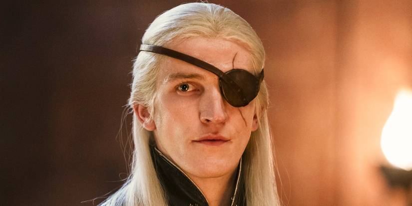 Aemond looks onward while wearing an eyepatch in House of the Dragon.