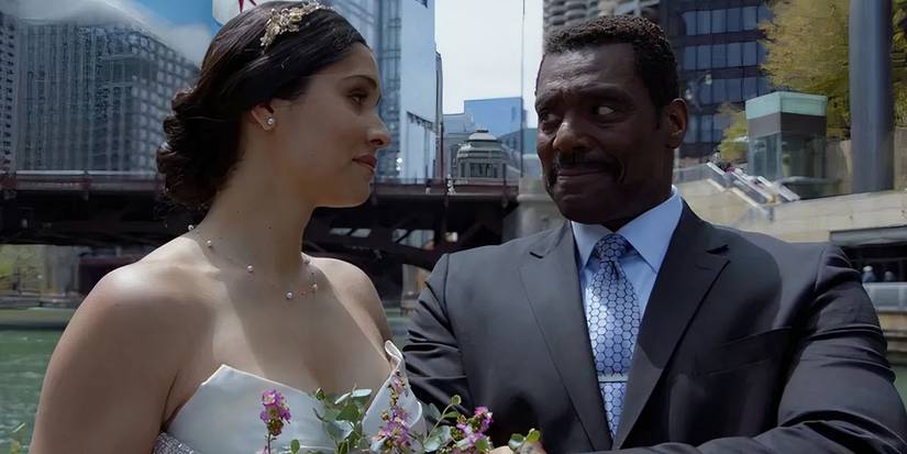 Boden walking Stella down the aisle at her wedding in Chicago Fire