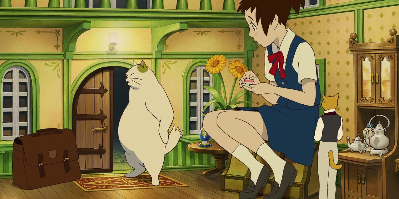 Haru drinking tea with Muta in the Baron's house in The Cat Returns.