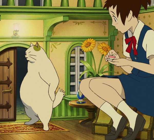 Haru drinking tea with Muta in the Baron's house in The Cat Returns.