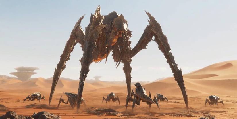 An image of terminids from Helldivers 2 in a desert.