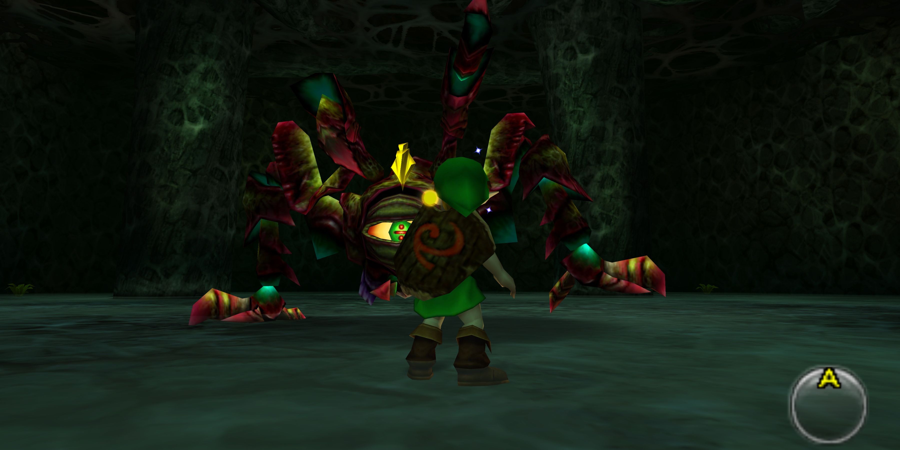 Link fights Gohma in The Legend of Zelda: Ocarina of Time 3D