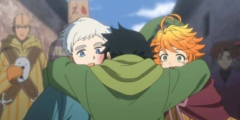 Ray hugs Norman and Emma in The Promised Neverland