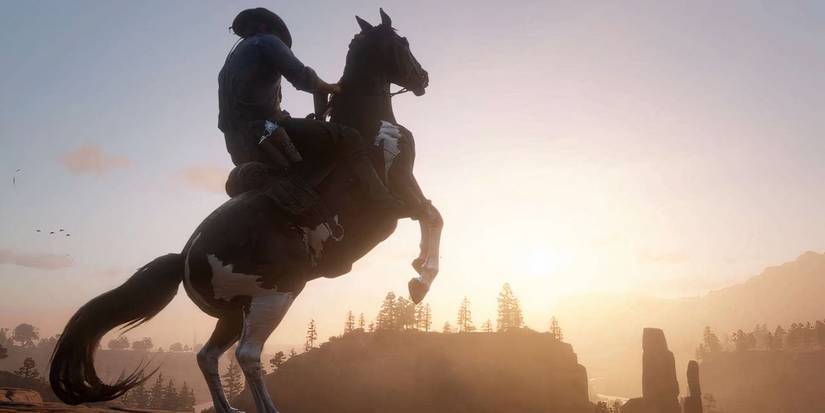 Horse doing a trick with a sunny background in Red Dead Redemption 2.