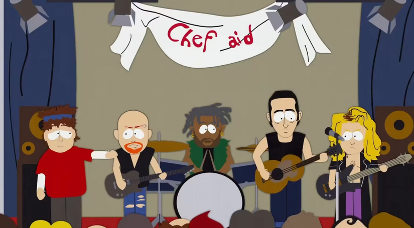 A band plays on a small stage for Chef Aid in South Park.