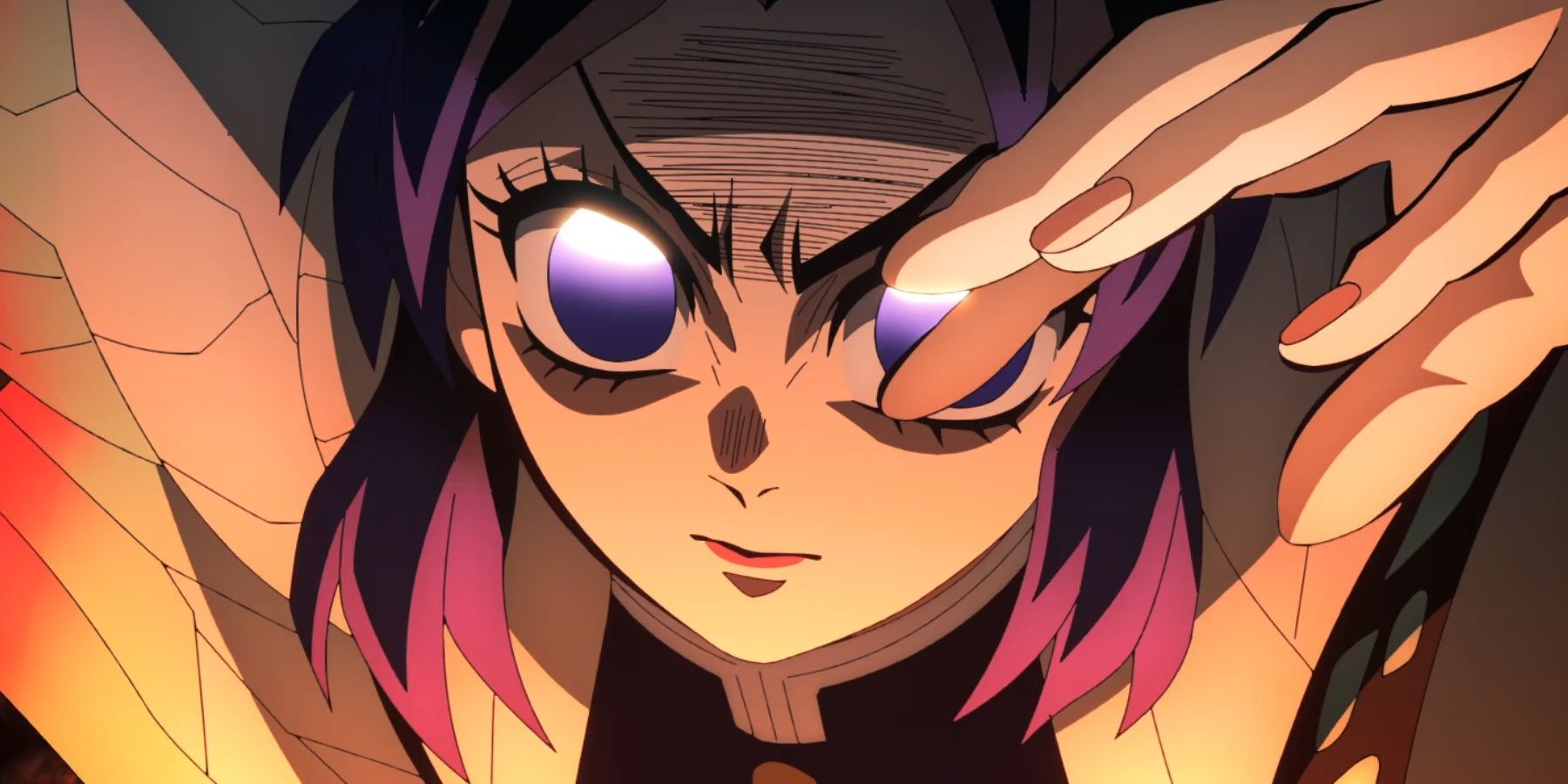 Shinobu Kocho attacks with her hand raised.