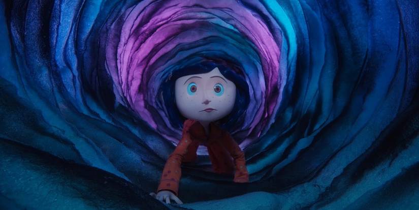 Coraline crawls through the magical tunnel from the cupboard door into the Other Mother's world.