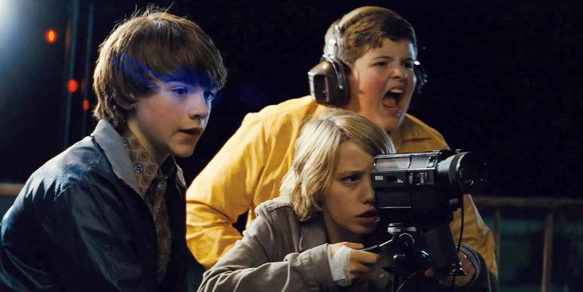 Joe (Joel Courtney), Cary (Ryan Lee), and Charles (Riley Griffiths) film their movie in Super 8