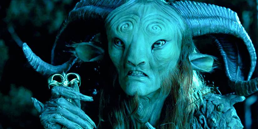 Faun from Pan's Labyrinth holding an object.