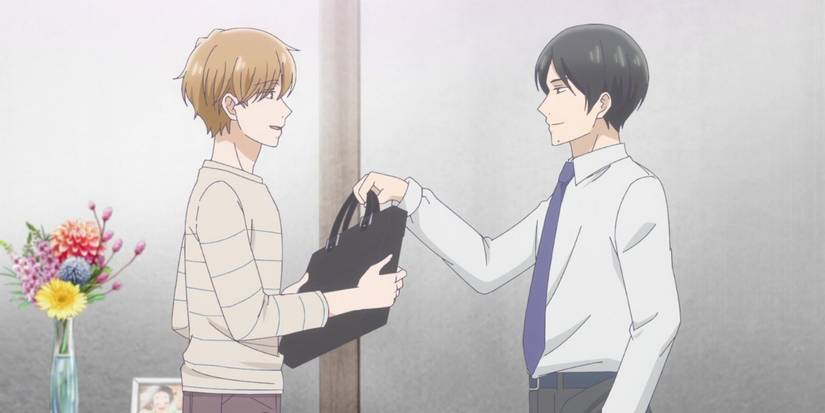 Masaki holding out Hiromu’s briefcase to him at their front door. 