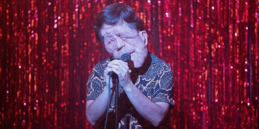 Oswald (Adam Pearson) kills it at karaoke in A Different Man.