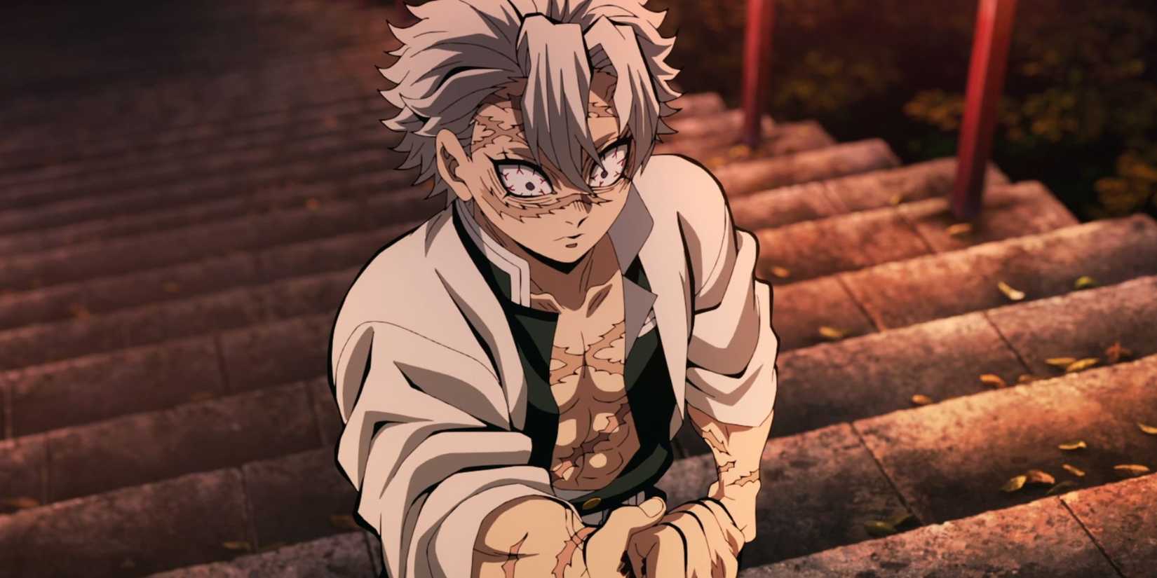 Sanemi Shinazugawa crushes a demon eye that had been following him on some stone steps in Demon Slayer