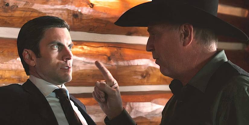 Kevin Costner as John Dutton and Wes Bentley as Jamie Dutton are arguing about something on the ranch in Yellowstone.