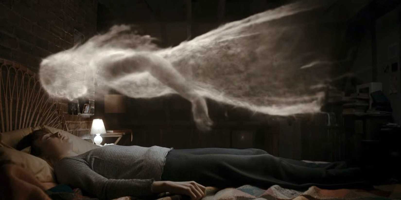 Annabel Ward's ghost floating over a sleeping Lucy Carlyle (Ruby Stokes) in Lockwood & Co.