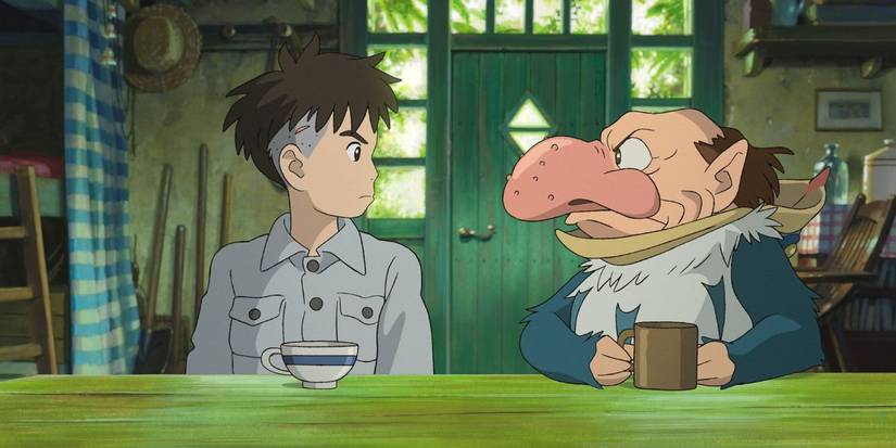 Mahito and the Gray Heron face each other while glaring in The Boy and the Heron.