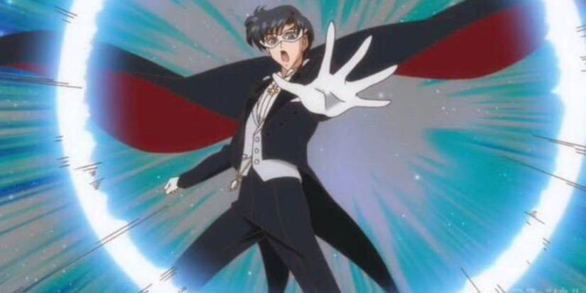 Tuxedo Mask holds out his hand to attack in Sailor Moon.