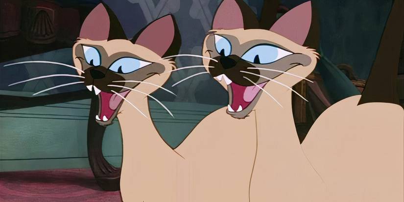 The Siamese cats are smiling in Lady and the Tramp