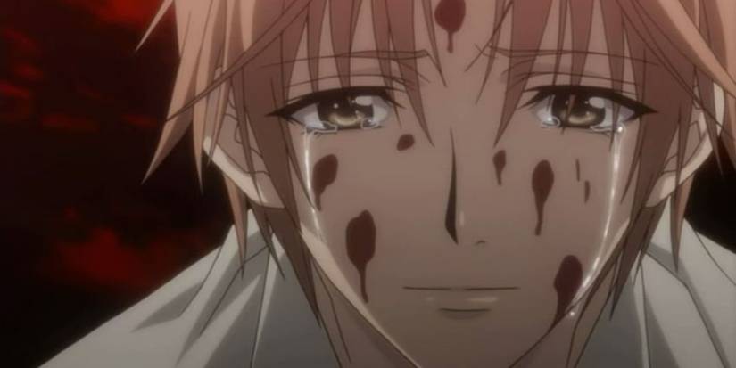 Yuki cries with blood on his face in The Betrayal Knows My Name.