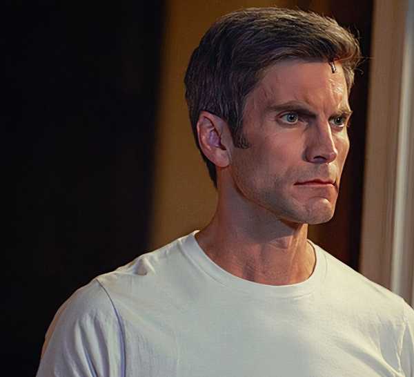 Jamie Dutton, played by Wes Bentley, wearing a white T-shirt and looking away in Yellowstone