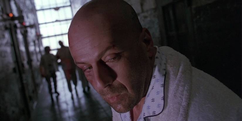 Bruce Willis as James Cole in an asylum in 12 Monkeys